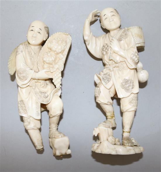 Two Japanese ivory figures of farmers, early 20th century, 15.5cm, damage